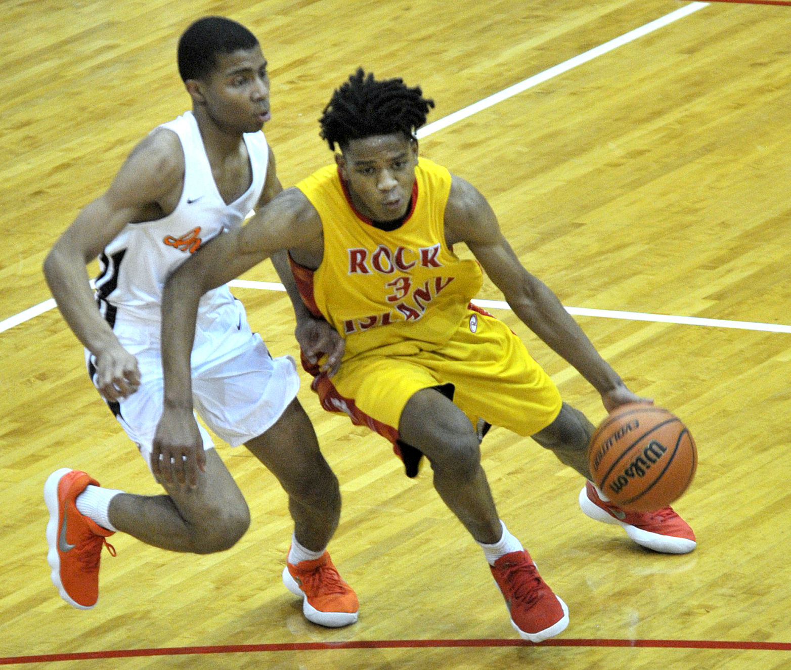 Rock Island Rocks and the Minooka Indians at the Rock Island-Milan Thanksgiving Classic boys basketball.